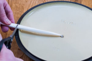 Step 7: The cutting of the cartouche to fit the pot.