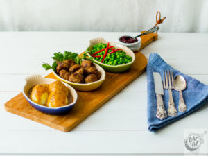 Mormor's Swedish Meatballs plated with potatoes, gravy and peas. Mormor's Swedish Meatballs plated with potatoes, gravy and peas.
