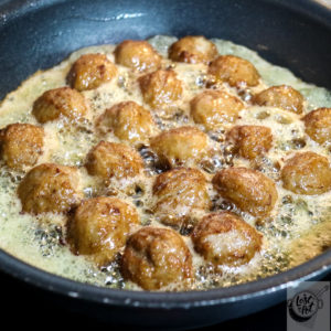 Meatballs frying. Meatballs frying.