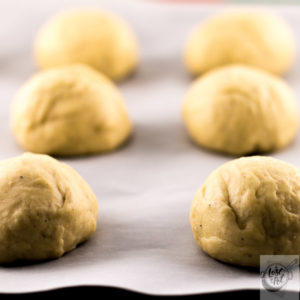 Semlor buns, rolled and risen for the second time.