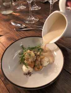 Mussel soup over smoked fresh cheese and sauteed fennel 