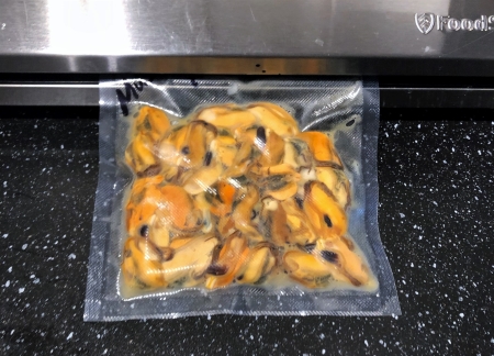 Cooked mussels in a vacuum pack.