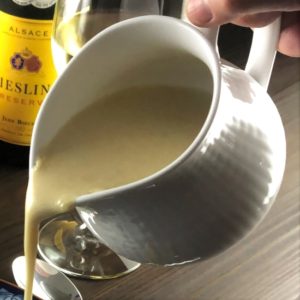 Pouring the mussel bisque.
