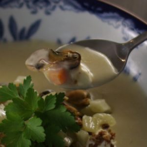 Tasting the mussel soup with smoked fresh cheese and sautéed fennel.